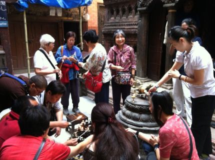 7 Butter Lamp Offering at MahaBuddha Stupa