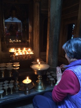 Lighting Butter Lamps at 10K stupa